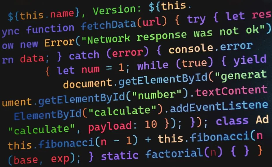 Close-up view of HTML and CSS code shown on a computer monitor, well suited for programming and technology themes.